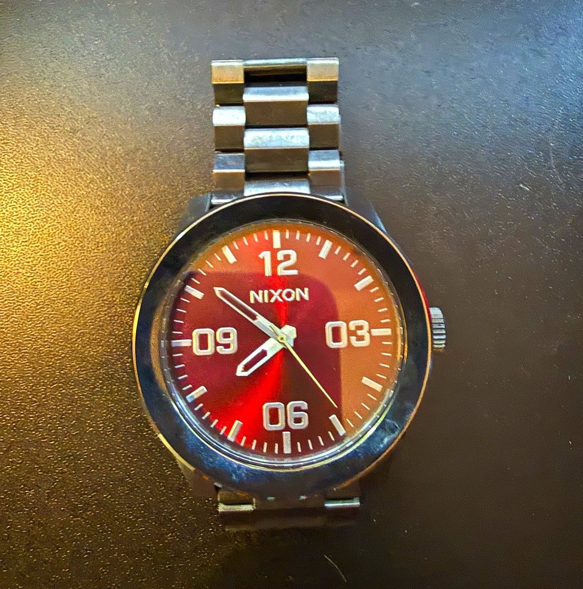 Nixon The Corporal Men’s Quartz Watch Red Dial Gray Stainless Bracelet 100m