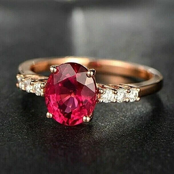 3.00 Ct Oval Cut Lab Created Ruby Halo Engagement Ring In 14K Rose Gold Plated.