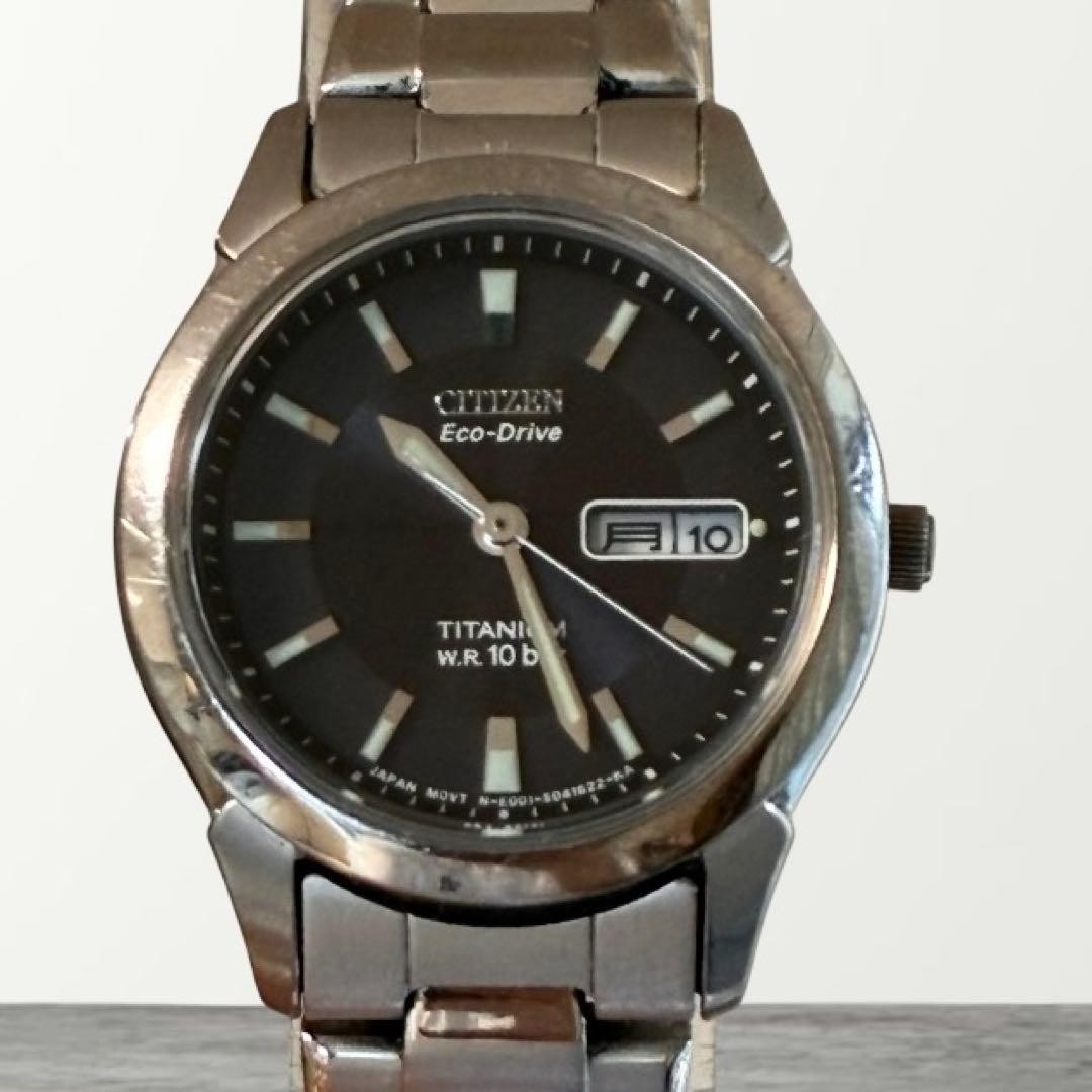 [Working] CITIZEN Eco-Drive E001-S024633, with engraving on the case back.