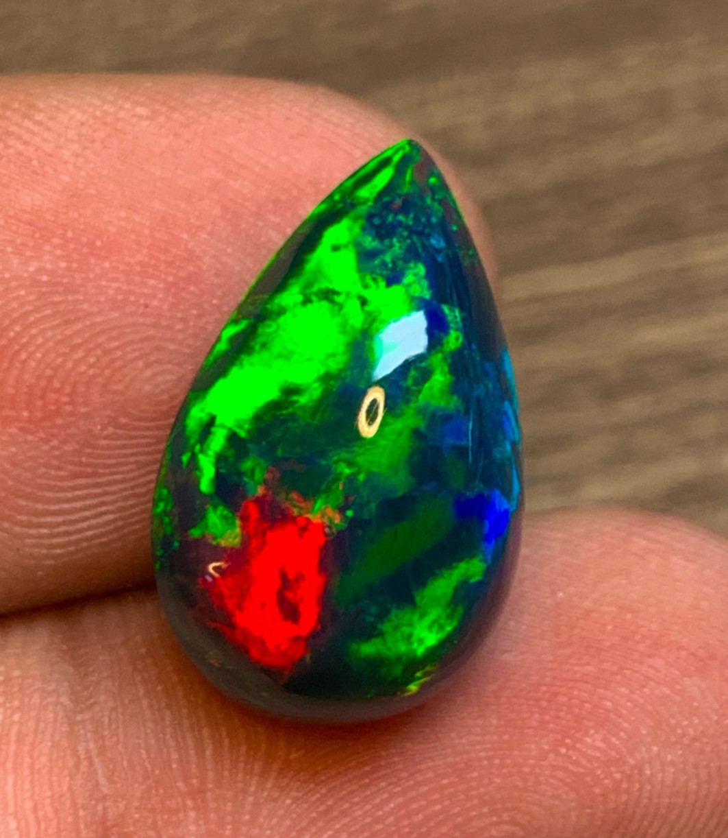7.7ct Multi-Fire Ethiopian Black Welo Opal Pear Cabochon Statement Jewelry