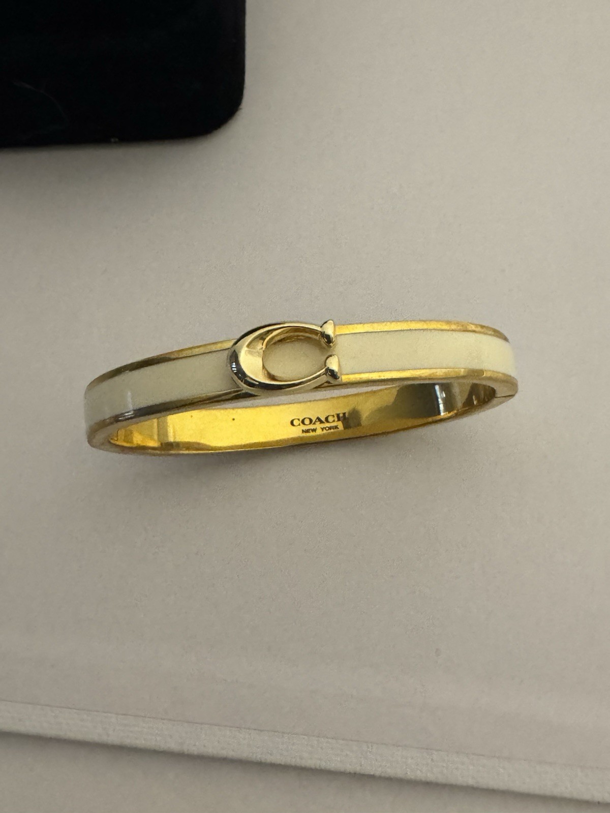 Coach Gold Tone White Enamel Oval Bangle Bracelet Signed No Stone