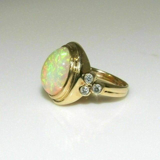 Fire Opal 2.50Ct Oval Cut Diamond Bezel Engagement Ring 14K Yellow Gold Finish