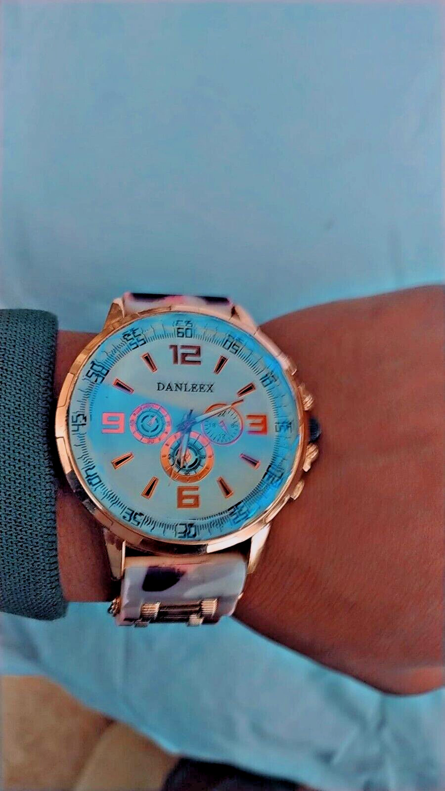 A Beautiful Mens Watch Made Of Colored Leather And Beautiful Hands