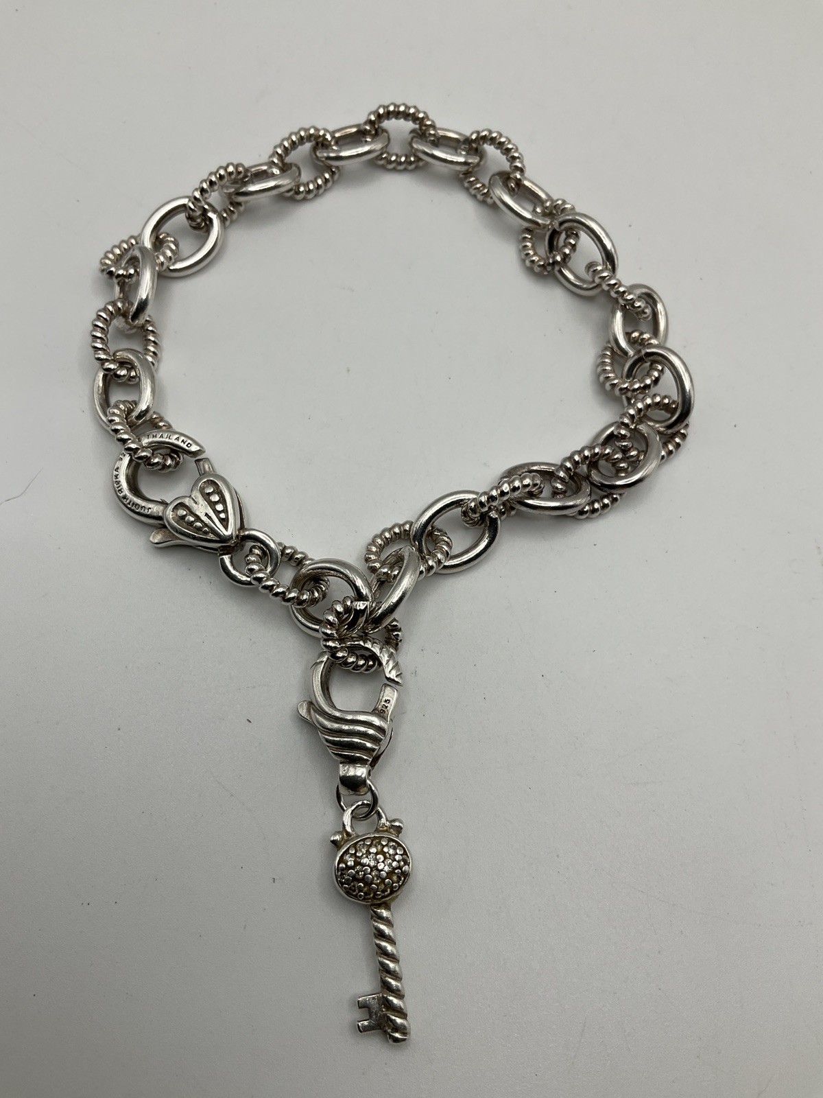 JUDITH RIPKA Sterling Silver link chain with key charm Bracelet 8.5”