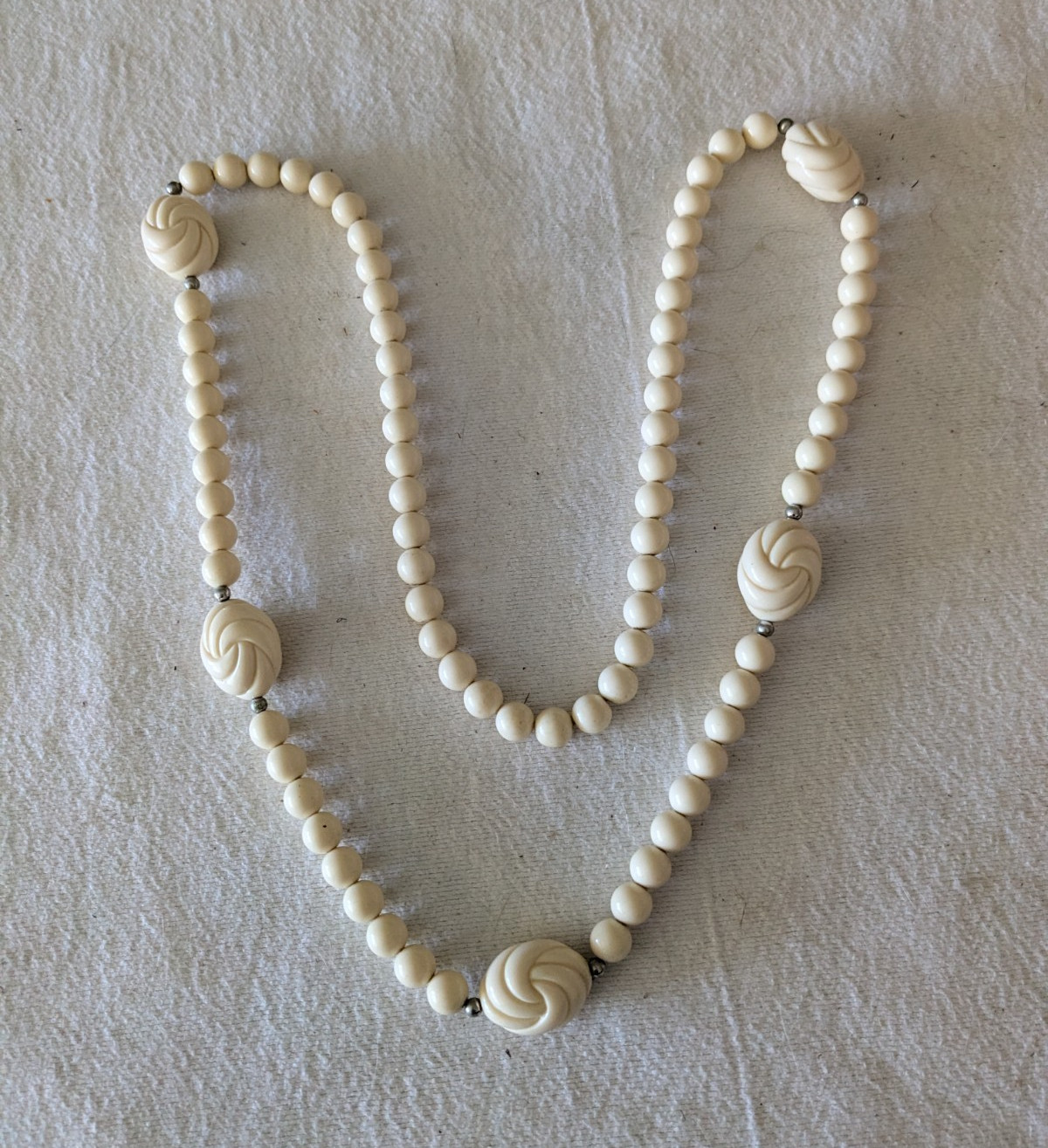 34″ Cream Acrylic Bead Necklace With 3 Lover’s Knot Stations