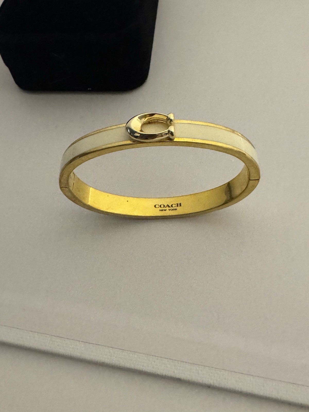 Coach Gold Tone White Enamel Oval Bangle Bracelet Signed No Stone