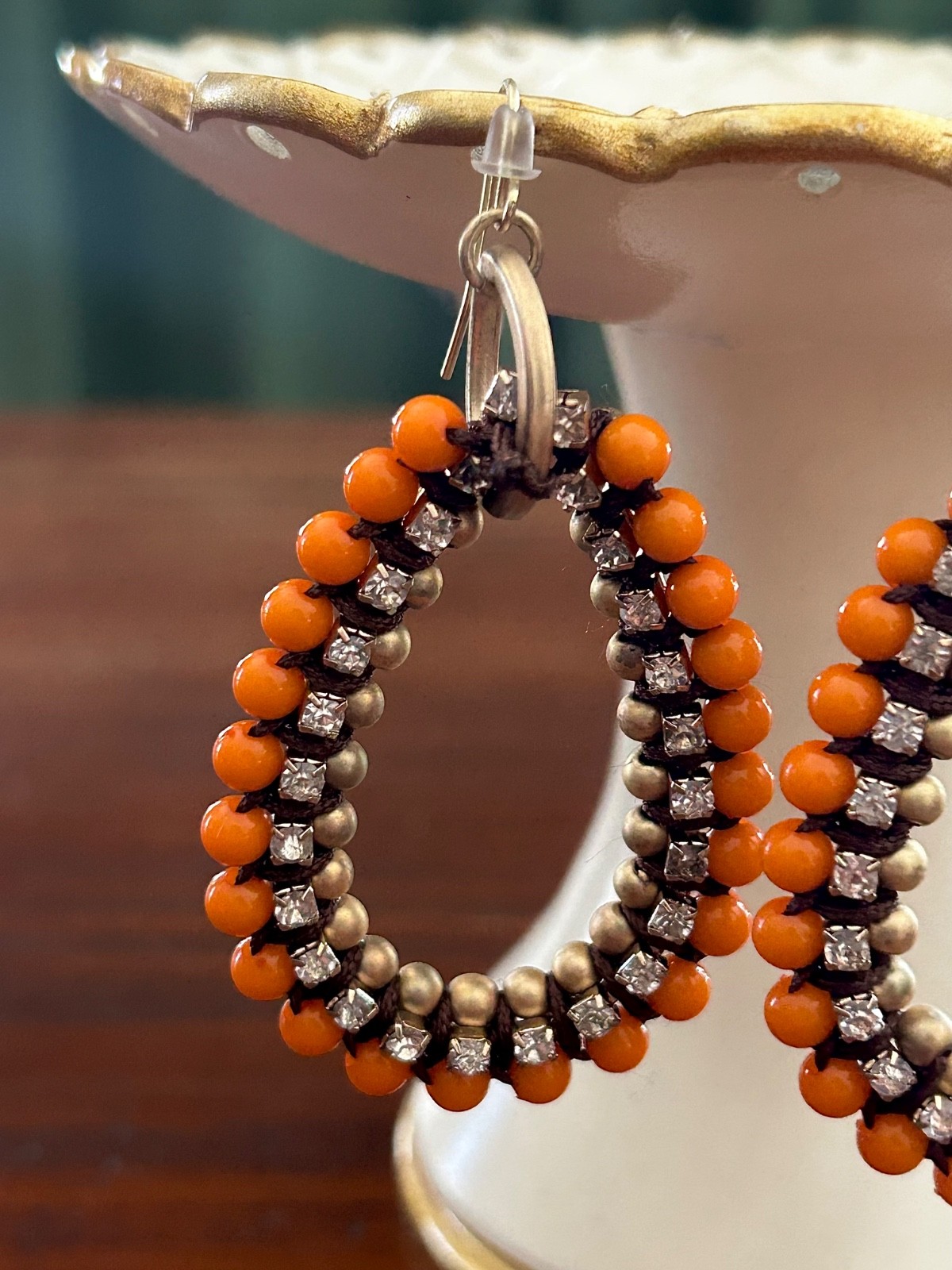 Orange beaded dangle earrings