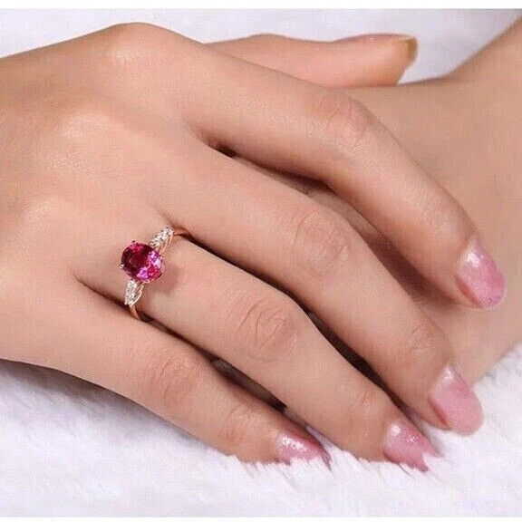 3.00 Ct Oval Cut Lab Created Ruby Halo Engagement Ring In 14K Rose Gold Plated.