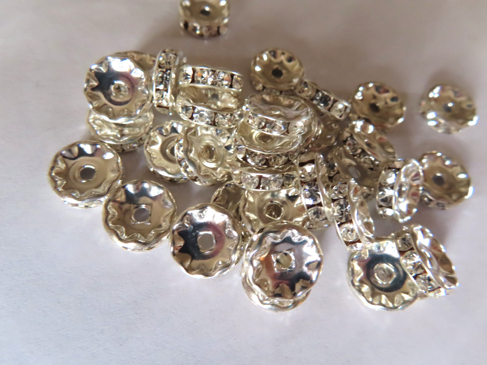 36 Czech Rhinestone round rondelles 10mm Crystal/Sterling plate.