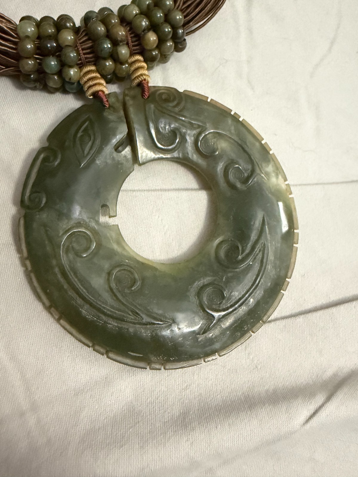 Carved Celadon Jade Bi Disc Statement necklace with Multi-strand Cord