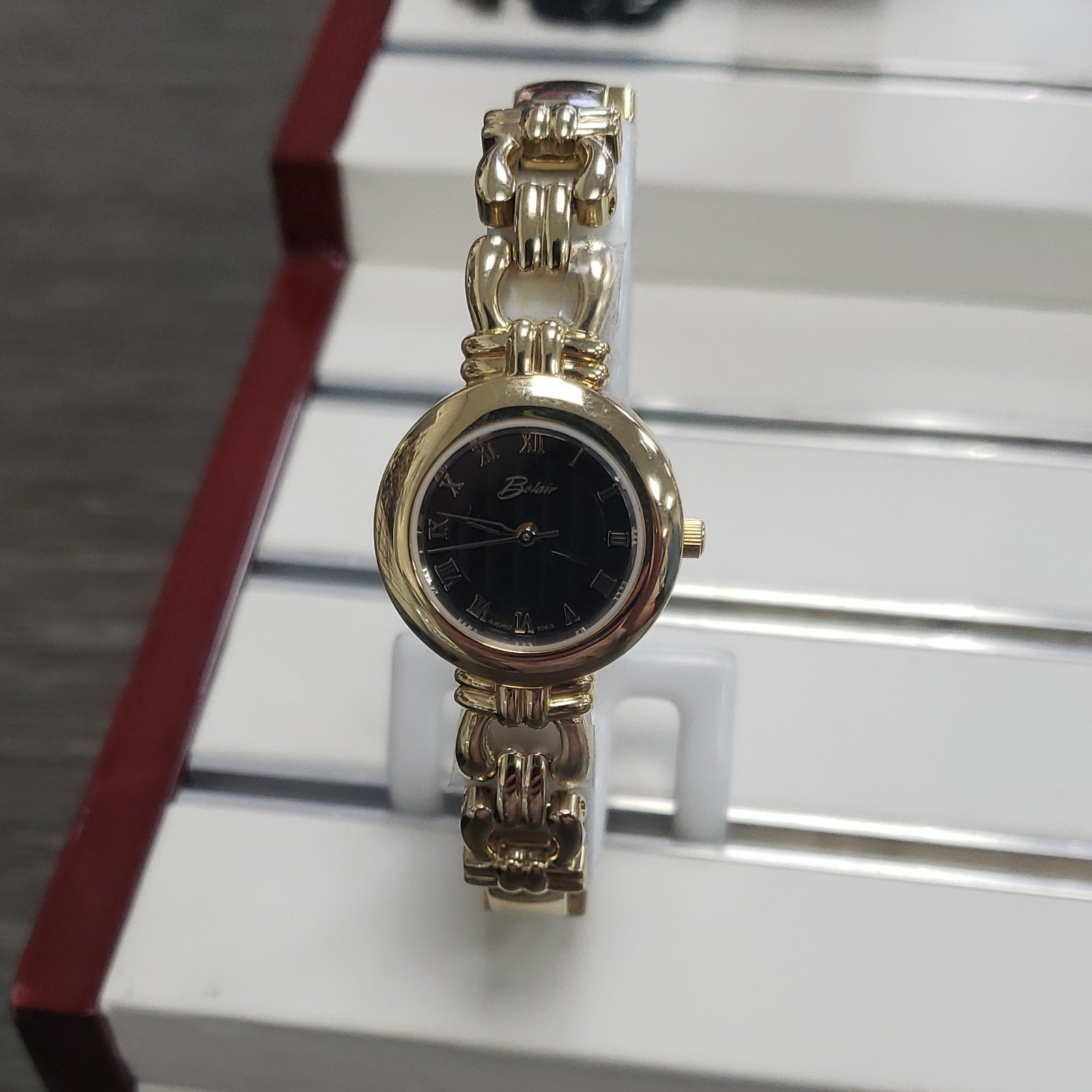 Belair Quartz Analog Wristwatch Gold Tone Metal Bracelet Black Roman Dial