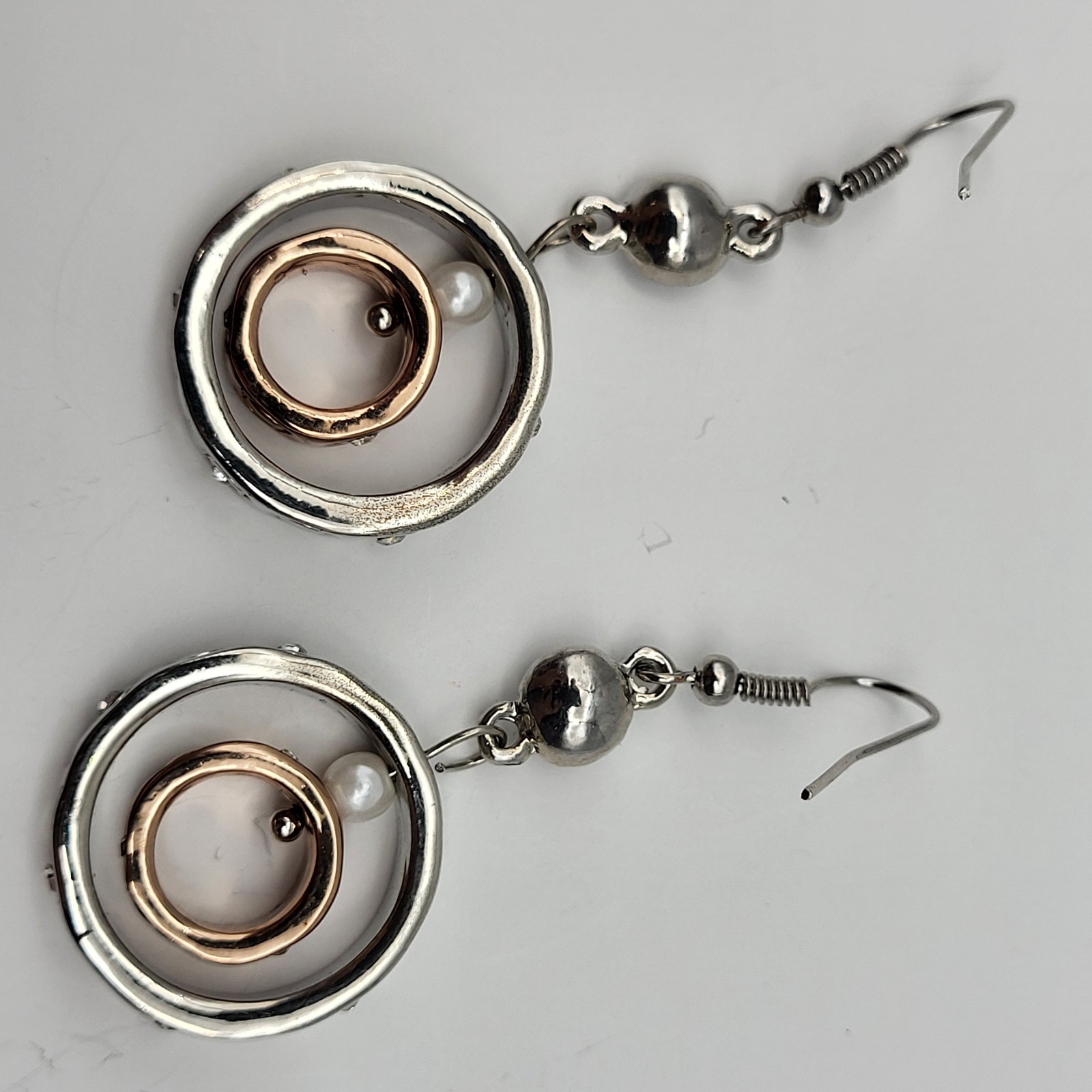 Fun Mixed metals articulated earrings screw print pierced dangles
