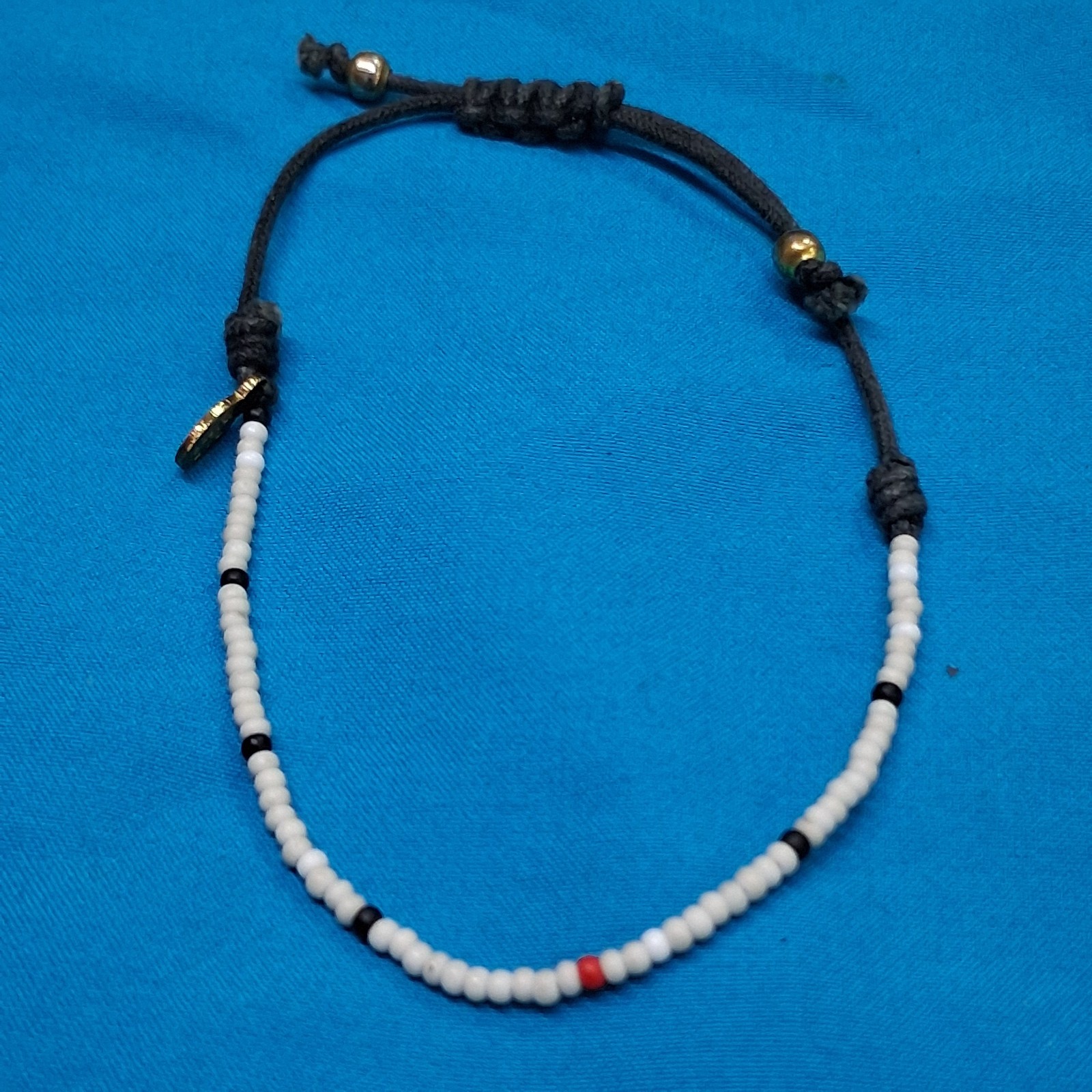 Bead Relief White Channel Set Stone Bead Black Cotton Cord Bangle Bracelet