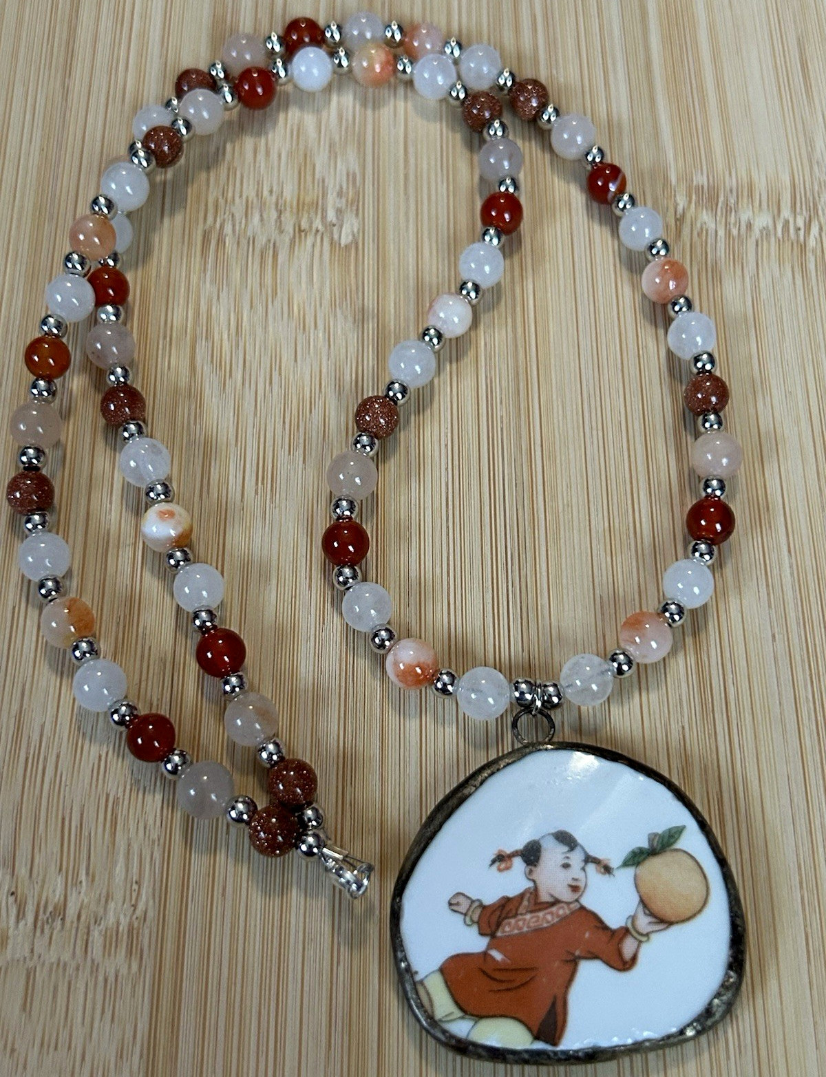 Handmade natural stone beaded necklace with vintage hand painted China pendant.