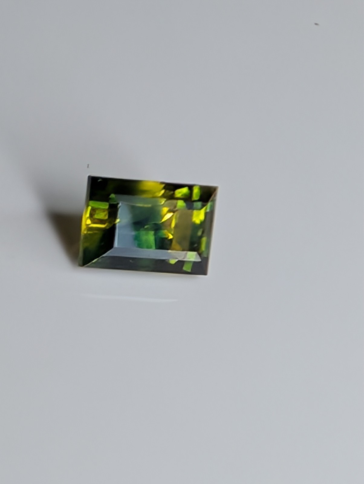USA seller .63 IF Parti Sapphire faceted gemstone