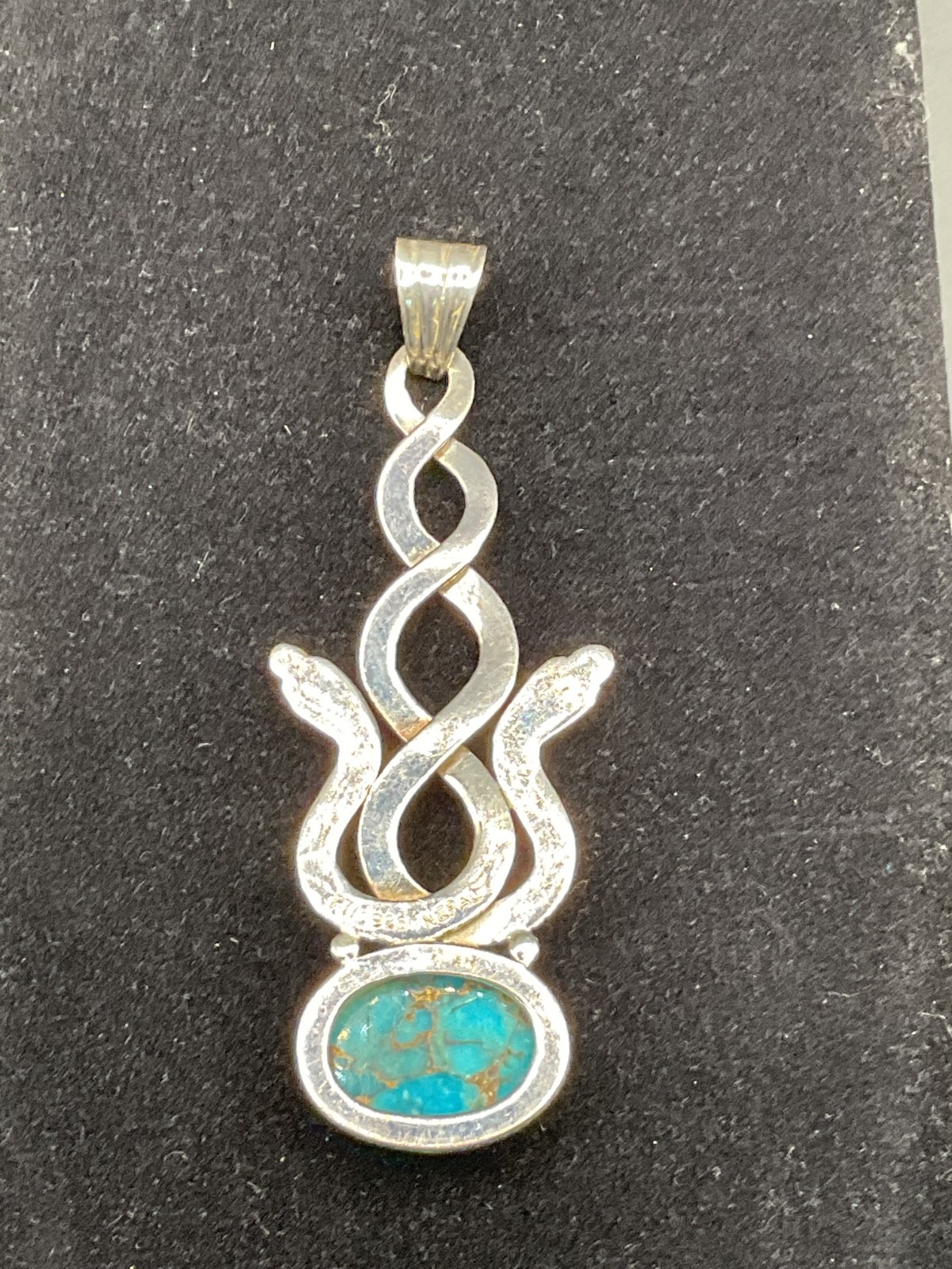 sterling silver vintage intertwined serpentine ( double snake) turquoise pendant