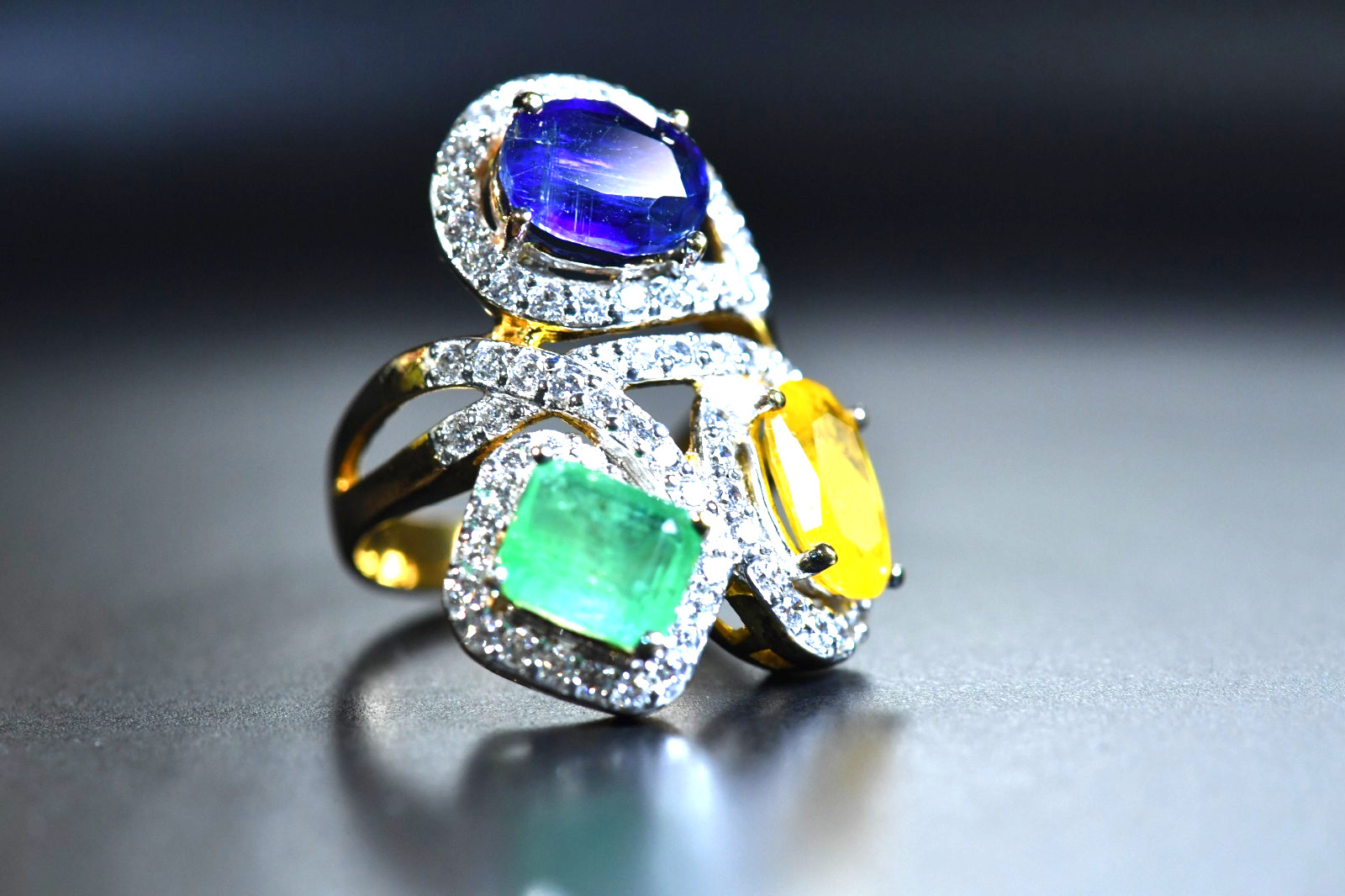 3 Stone Multi Gemstone Ring Emerald, Kyanite, Yellow, Sapphire surrounded CZ