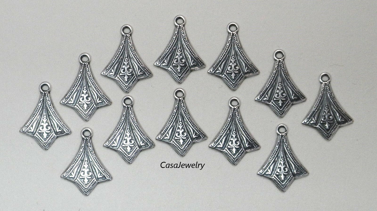 #3414 ANTIQUED STERLING SILVER PLATED DIE STRUCK ADORNMENT W/HANG RING – 12 Pcs