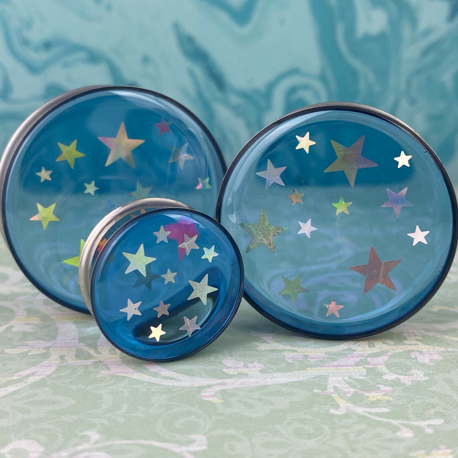 Pair of Blue Resin with Holographic Stars Plugs (EMB-013) gauges Choose Size