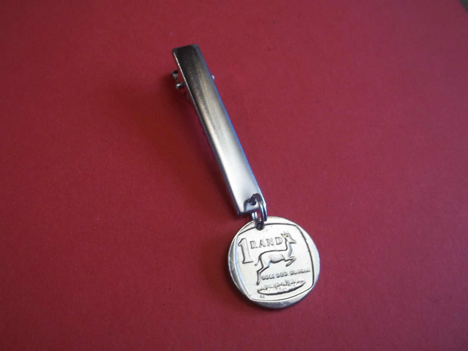 ONE (1) RAND COIN – SOUTH AFRICAN SPRINGBOK – SILVER NAPKIN CLIP – 1992 to 2018