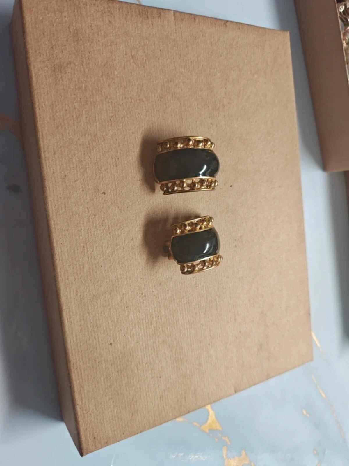 Gold and black earrings