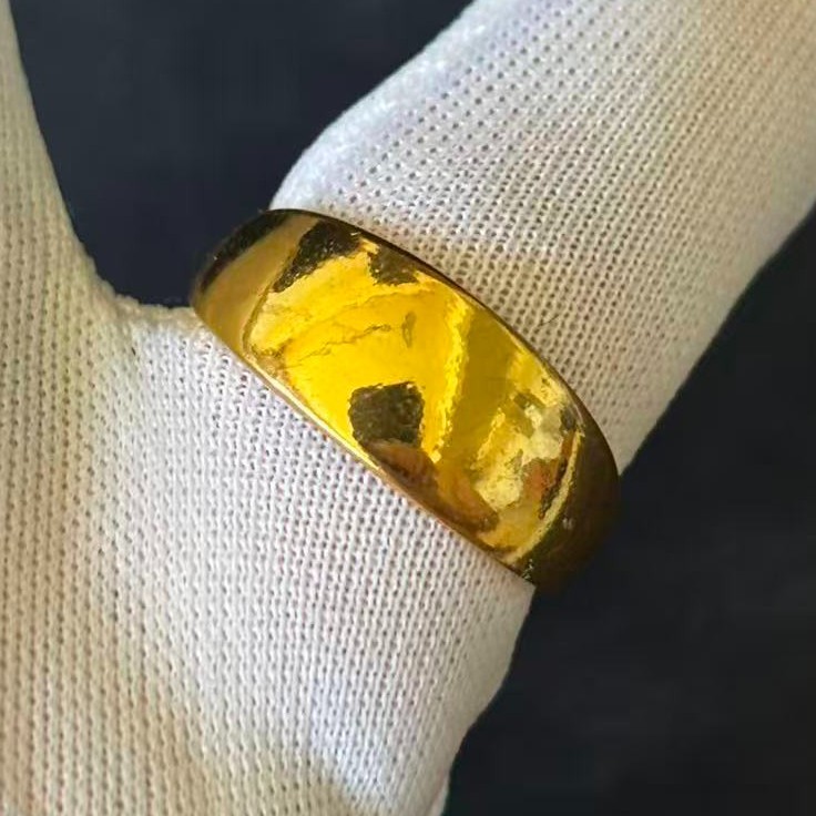 Smooth Band Ring Gold-plated? (NOT SURE) marked ‘ 999 ‘, Size 8 adjustable