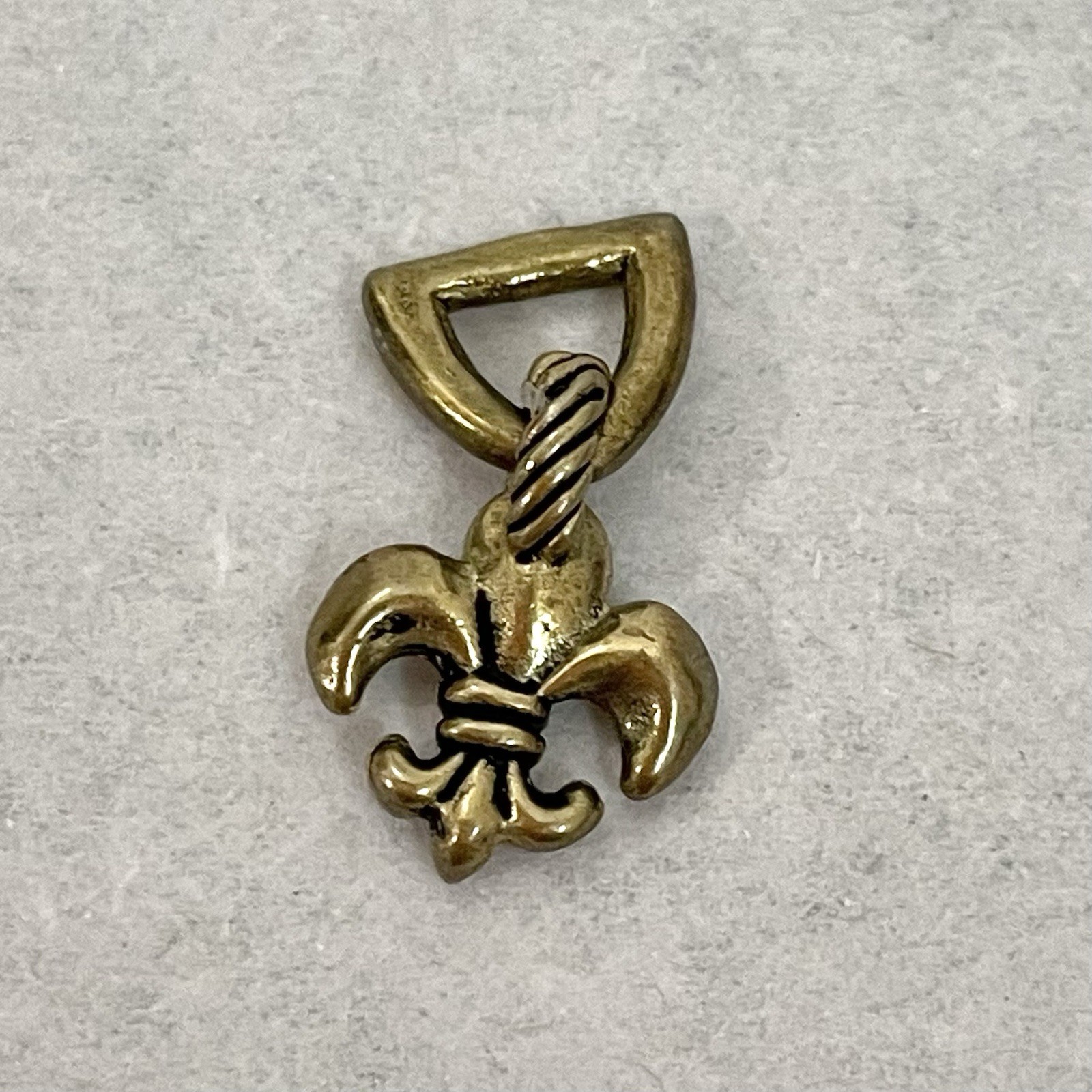 Waxing Poetic Brass Fleur de Lis Small Charm