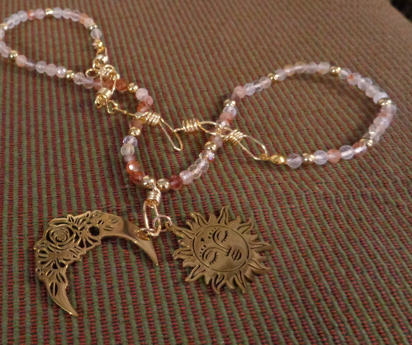 Artisan crafted,18”red rutilated quartz strand, hand knotted on silk, featuring