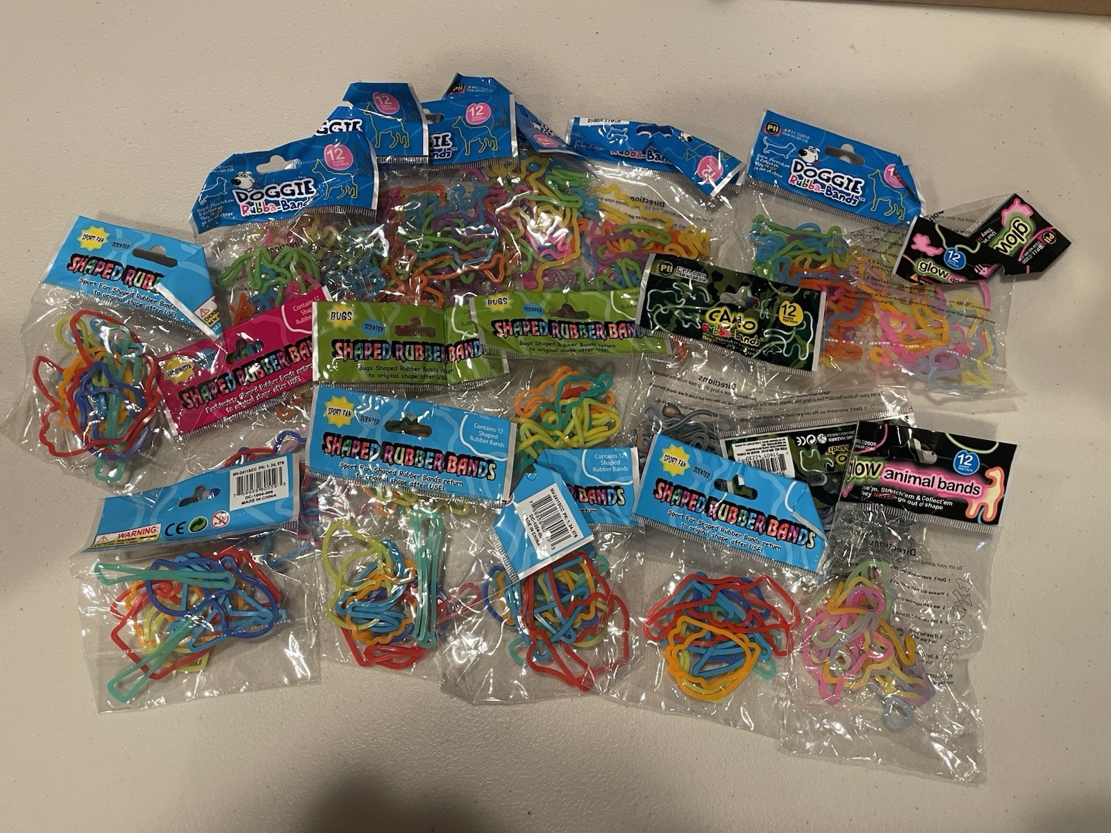 Lot of 18 Silly Bandz – Includes Dogs- Glow Animal- Camo- Shapes