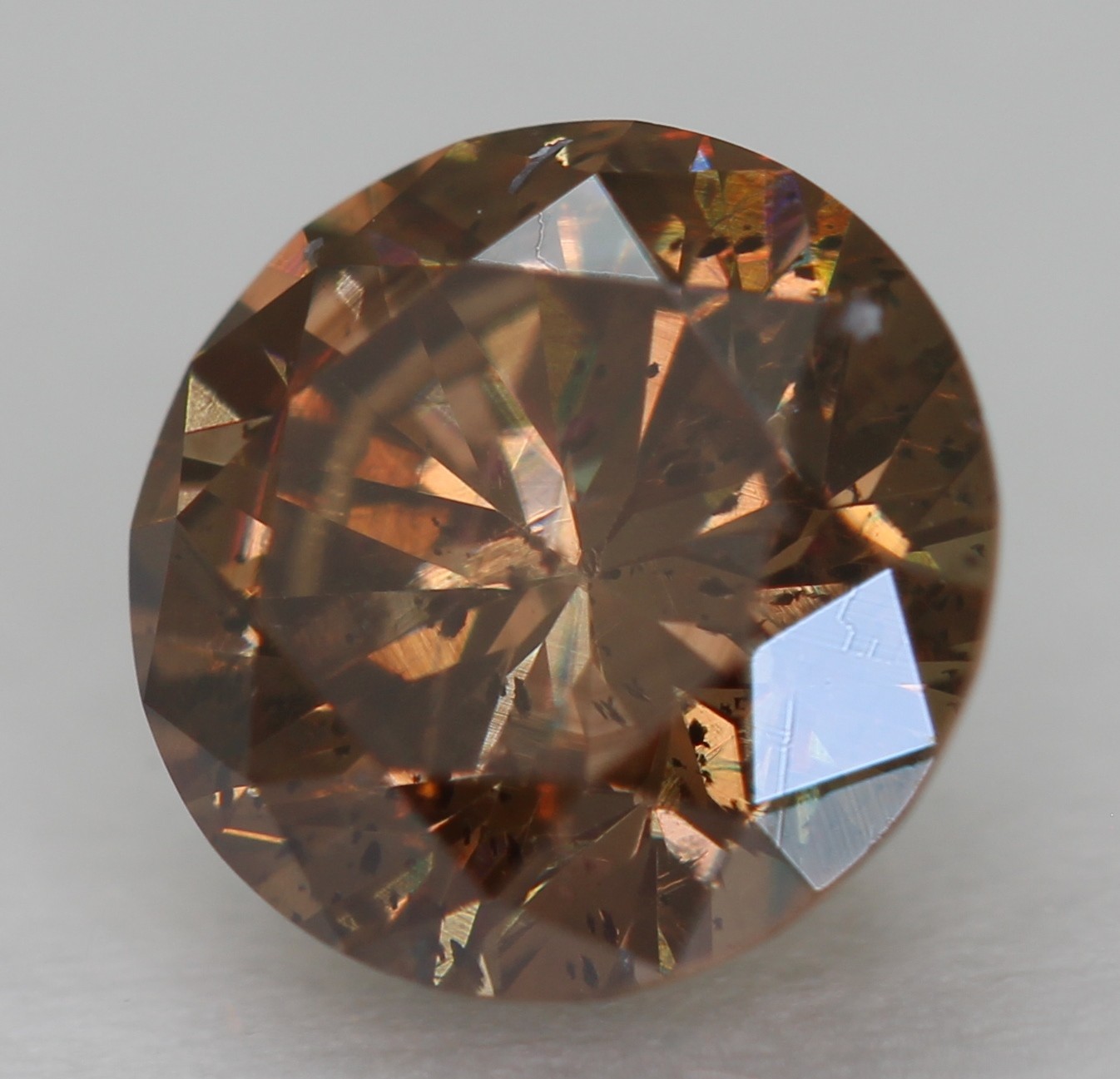0.64 Carat Yellow Brown VS2 Round Brilliant Natural Enhanced Diamond 5.49m VIDEO