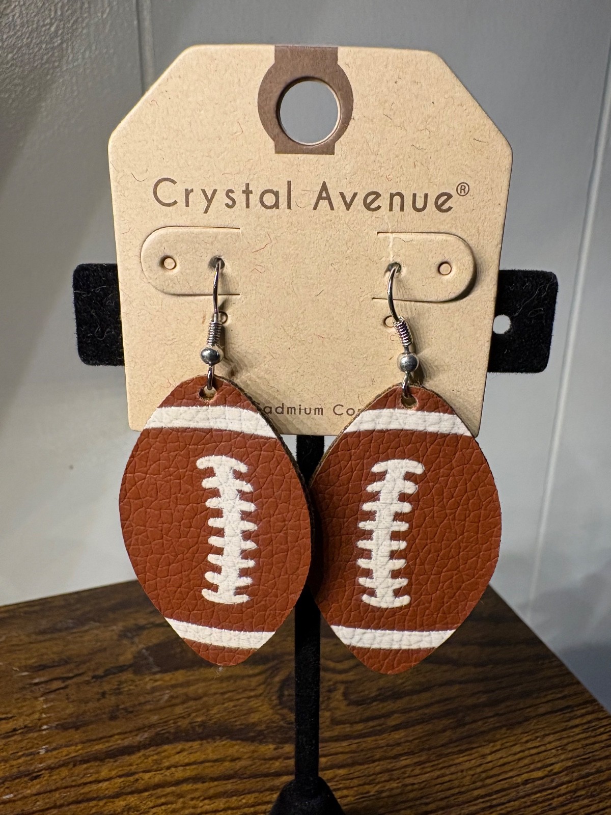 Crystal avenue football earrings faux leather