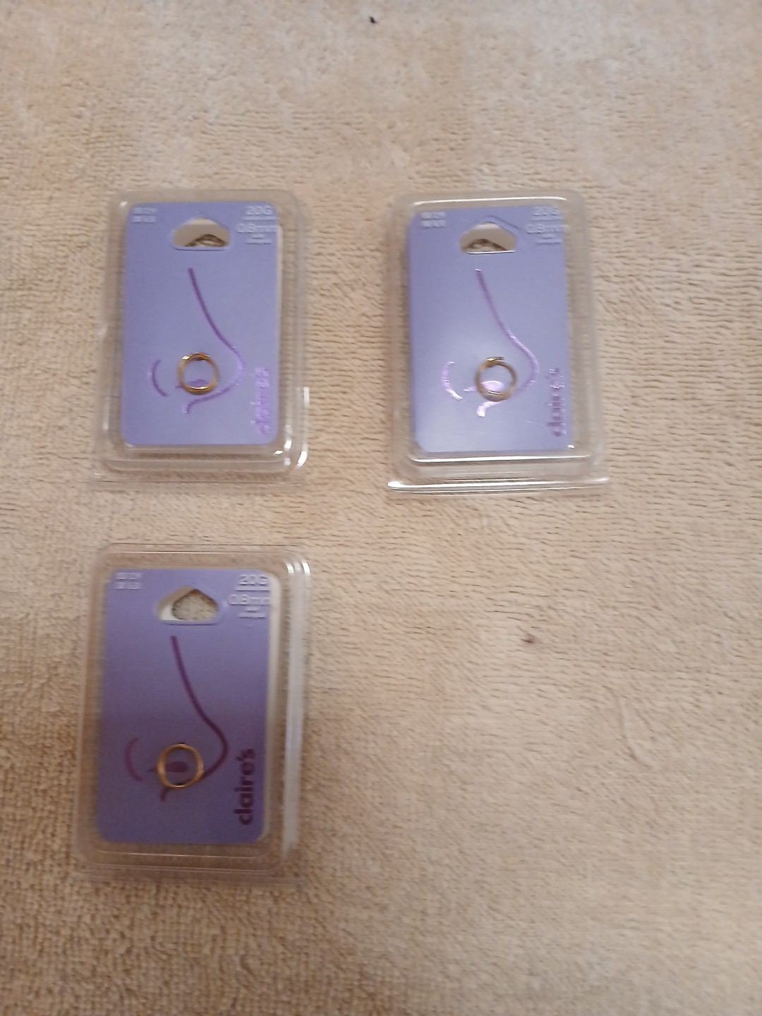 Bulk Lot Of (3)Stainless Steel Gold Tone Nose Rings. MSRP/lot $39. 20g/0.8 mm.
