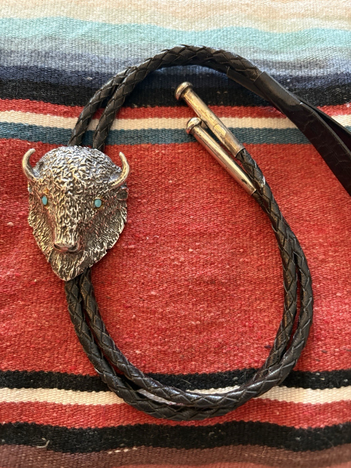 Buffalo Head Bolo Tie-Solid Cast Silver with Turquoise eyes