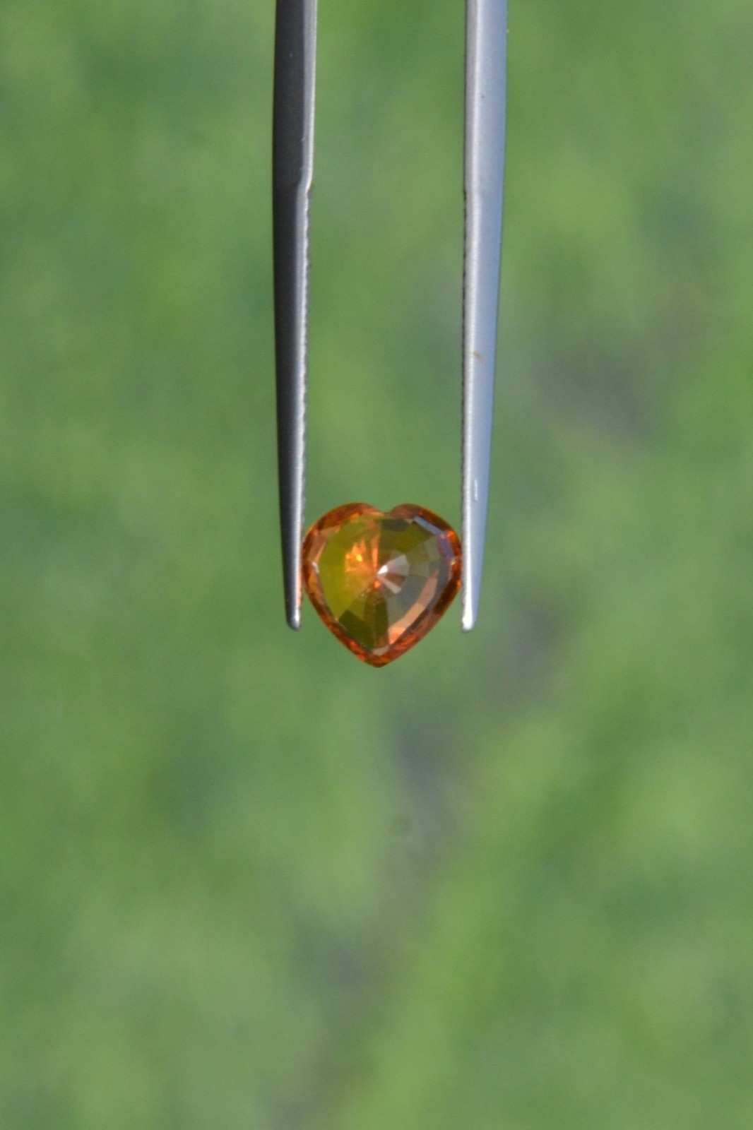 Natural Orange Sapphire 1.35 Carat. BE. Heated Heart Step Cut