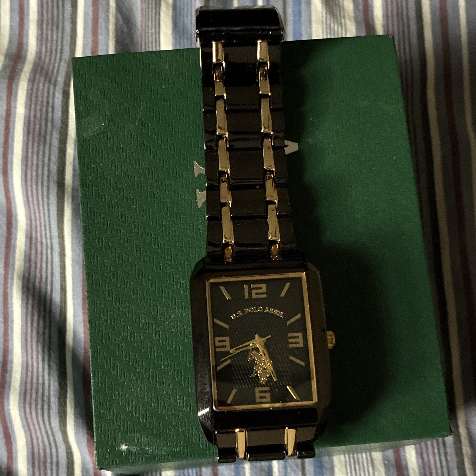 US Polo Assn. Men’s Rectangular Quartz Watch Black/Gold Two-Tone Bracelet