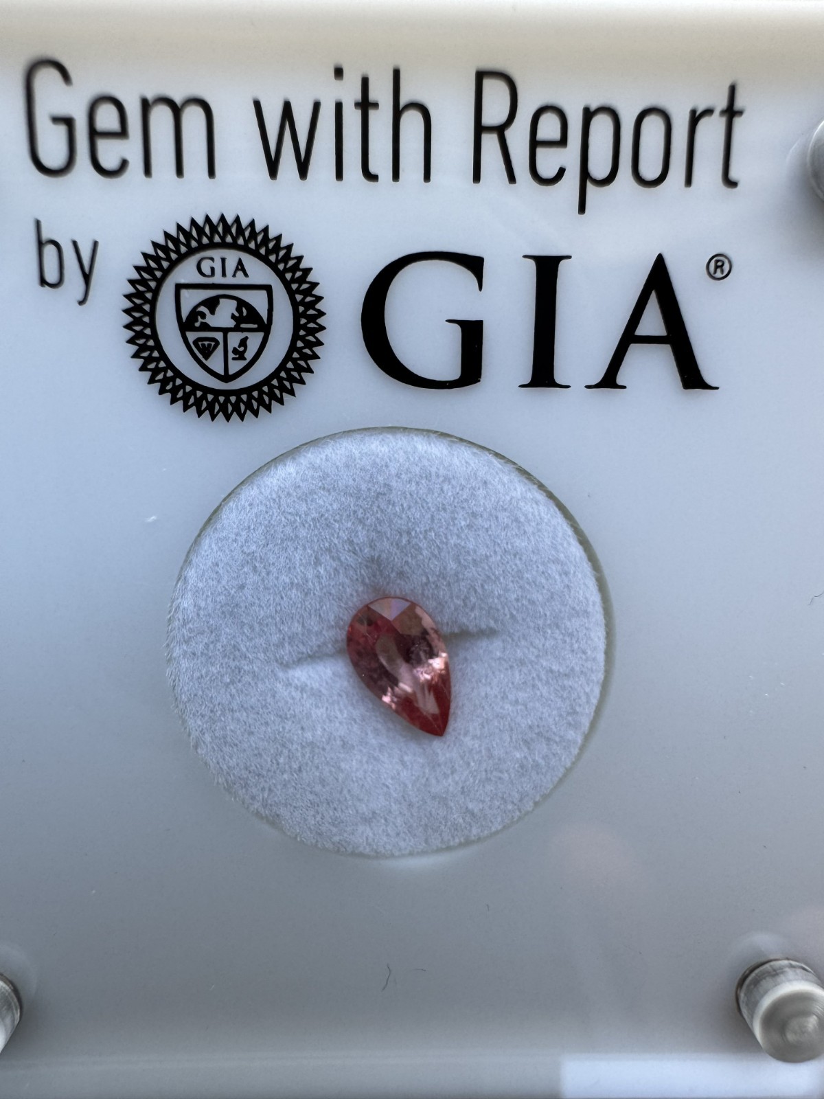 GIA Orangy Pink Sapphire Pear. 0.67 Carats 7.1 x 4.2 mm VSI, Beryllium Diffused