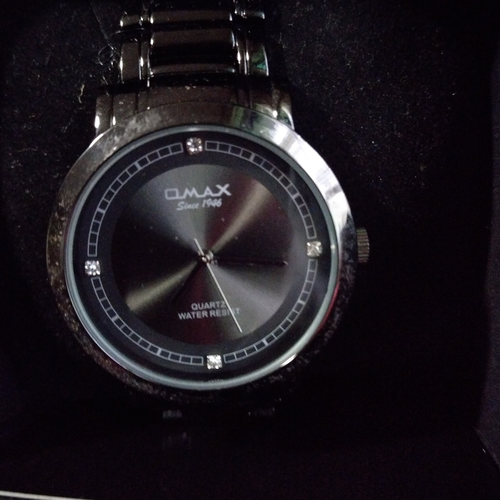OMAX Quartz Dress Watch Black Dial No Hour Marks Metal Bracelet Water Resistant