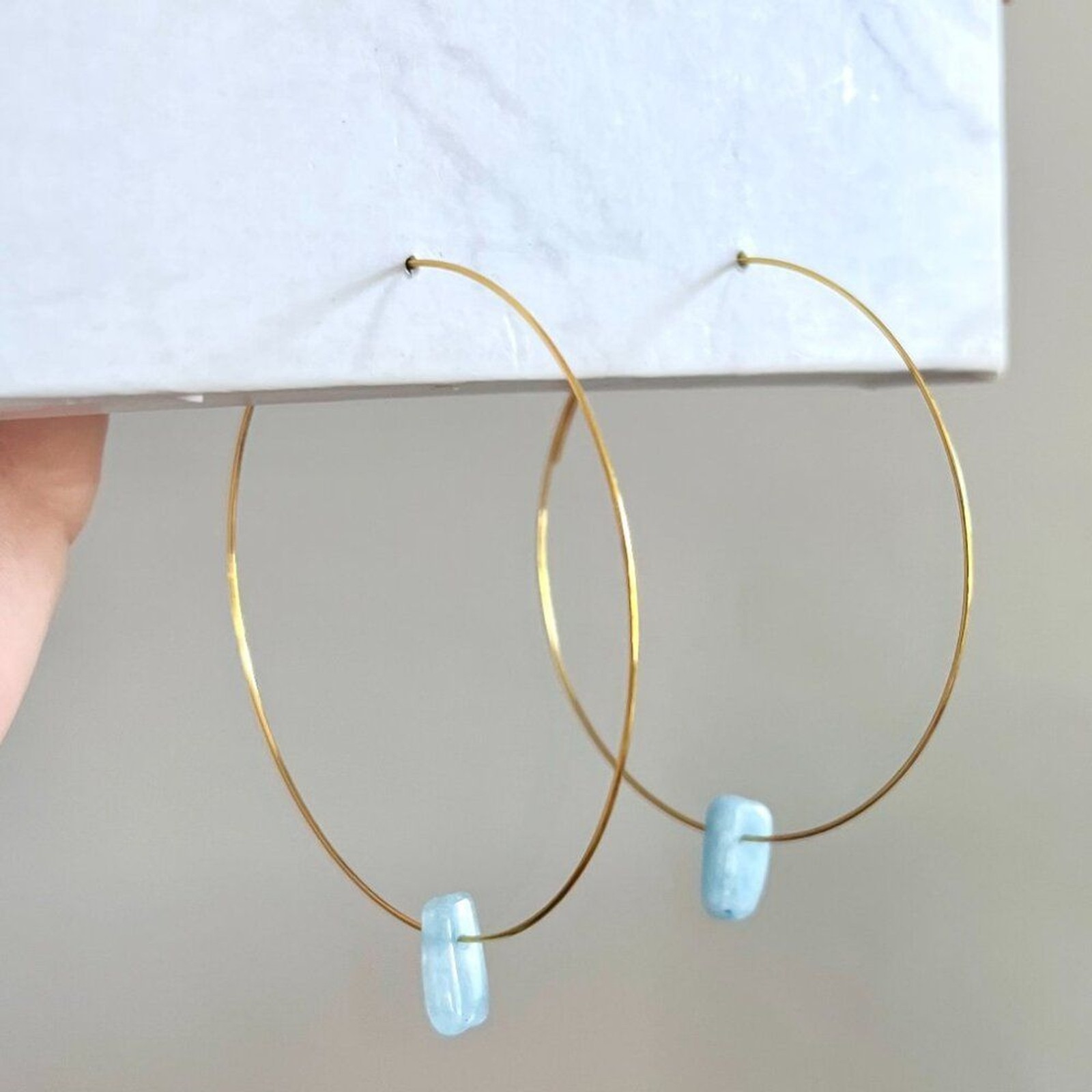 Gold Memory Wire Delicate Hoop Earrings with Blue Crystal Accent