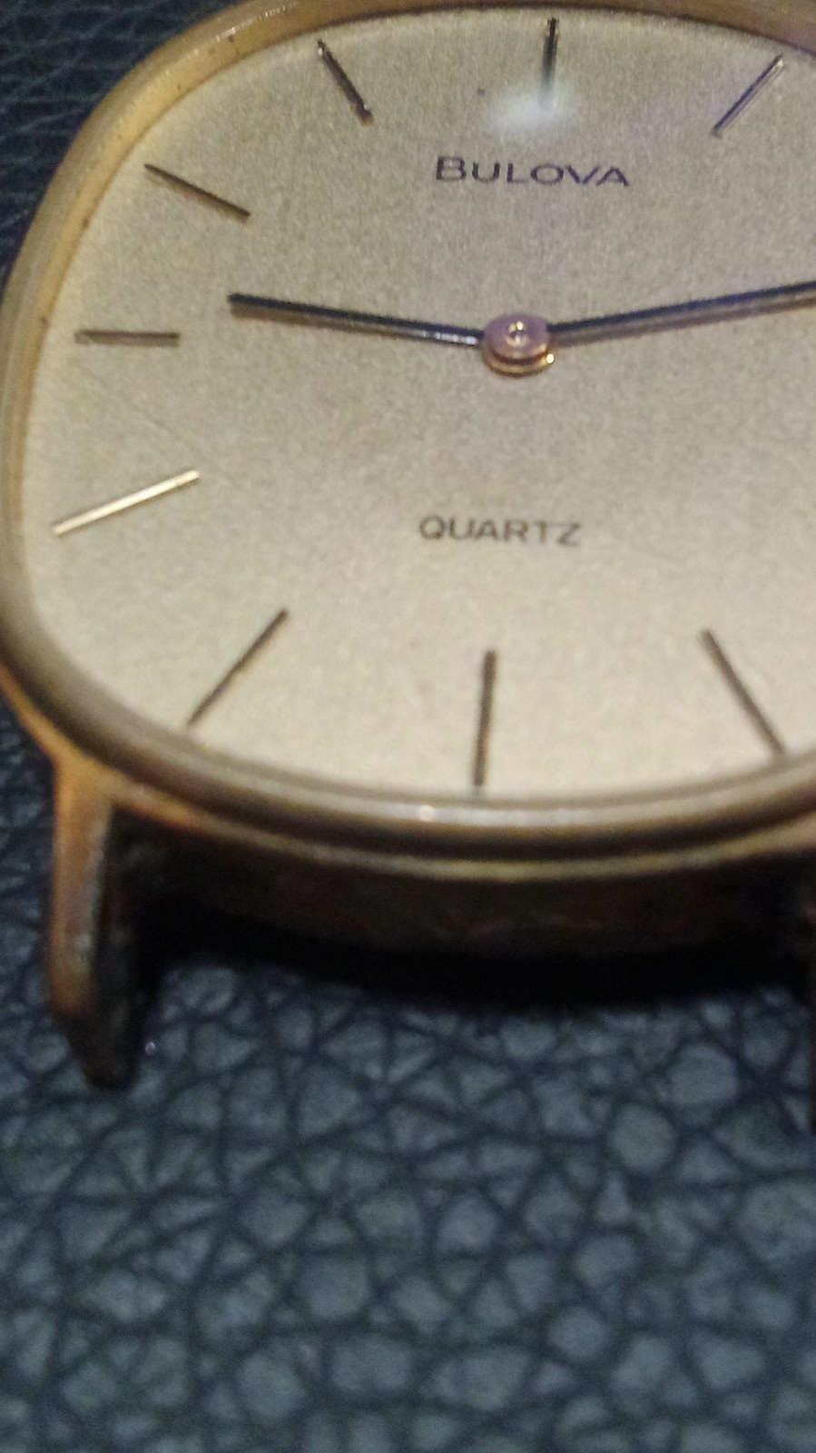 Bulova Quartz Wristwatch Round Gold Case Base Metal Stick Indexes Gold Dial