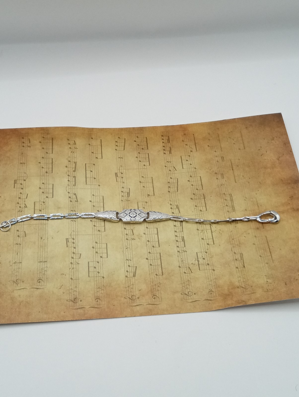 Handcrafted art deco era design silver bracelet