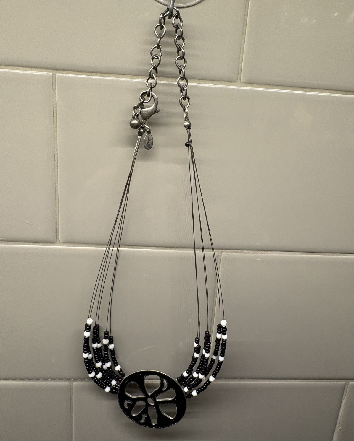 Chicos Necklace Black Pendant with Flower Cut out and Black & White Beads