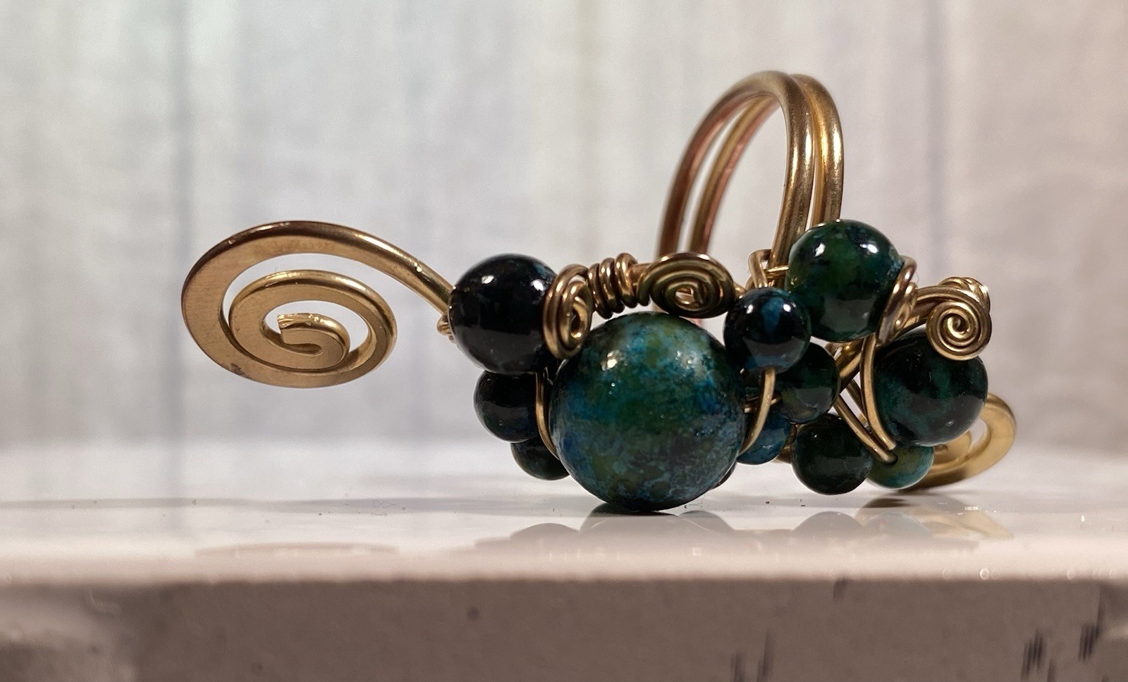 Handmade ring, green and blue gemstones, wire-wrapped in gold-toned metal