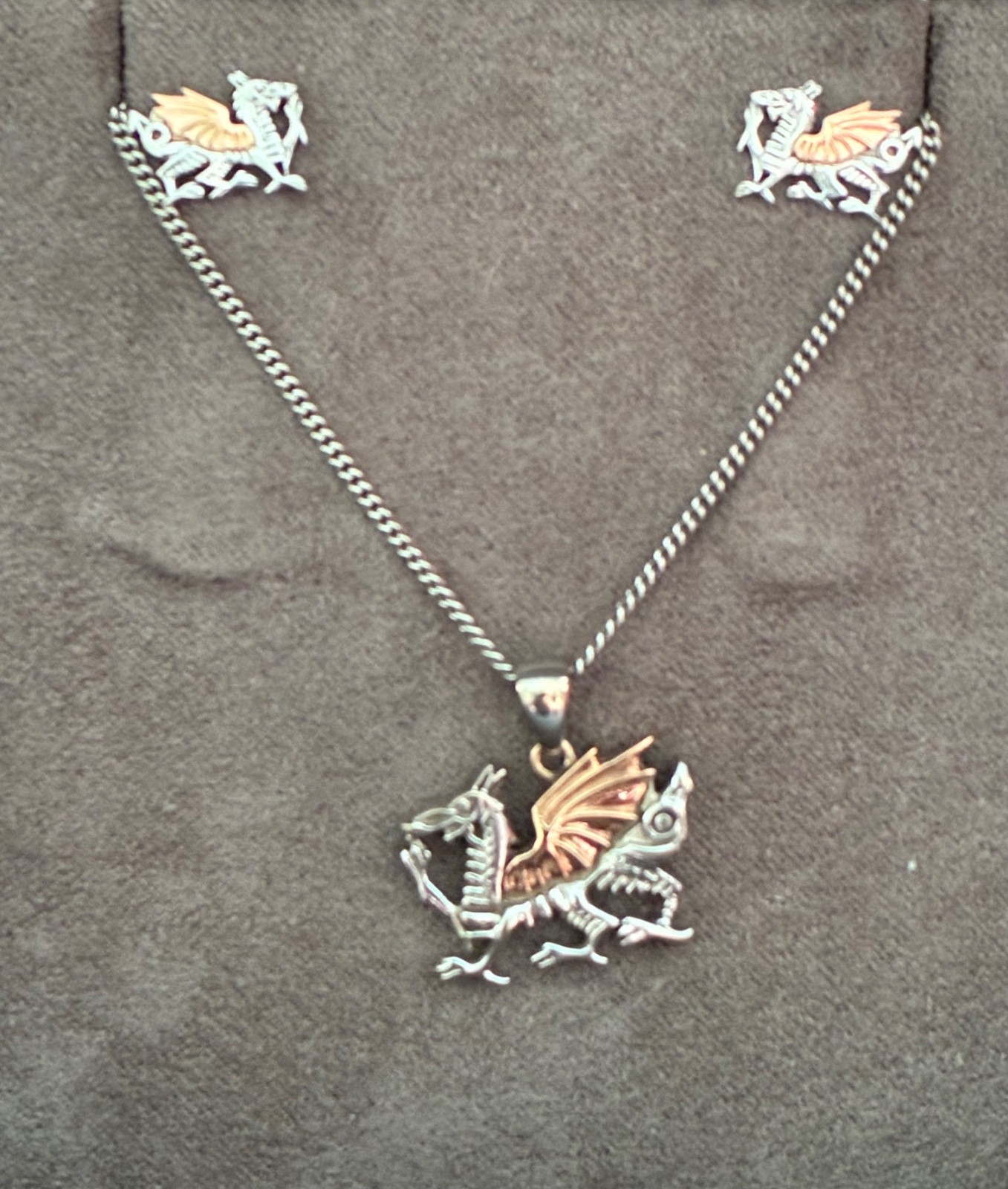 Clogau Silver and rose gold dragon pendant and earrings