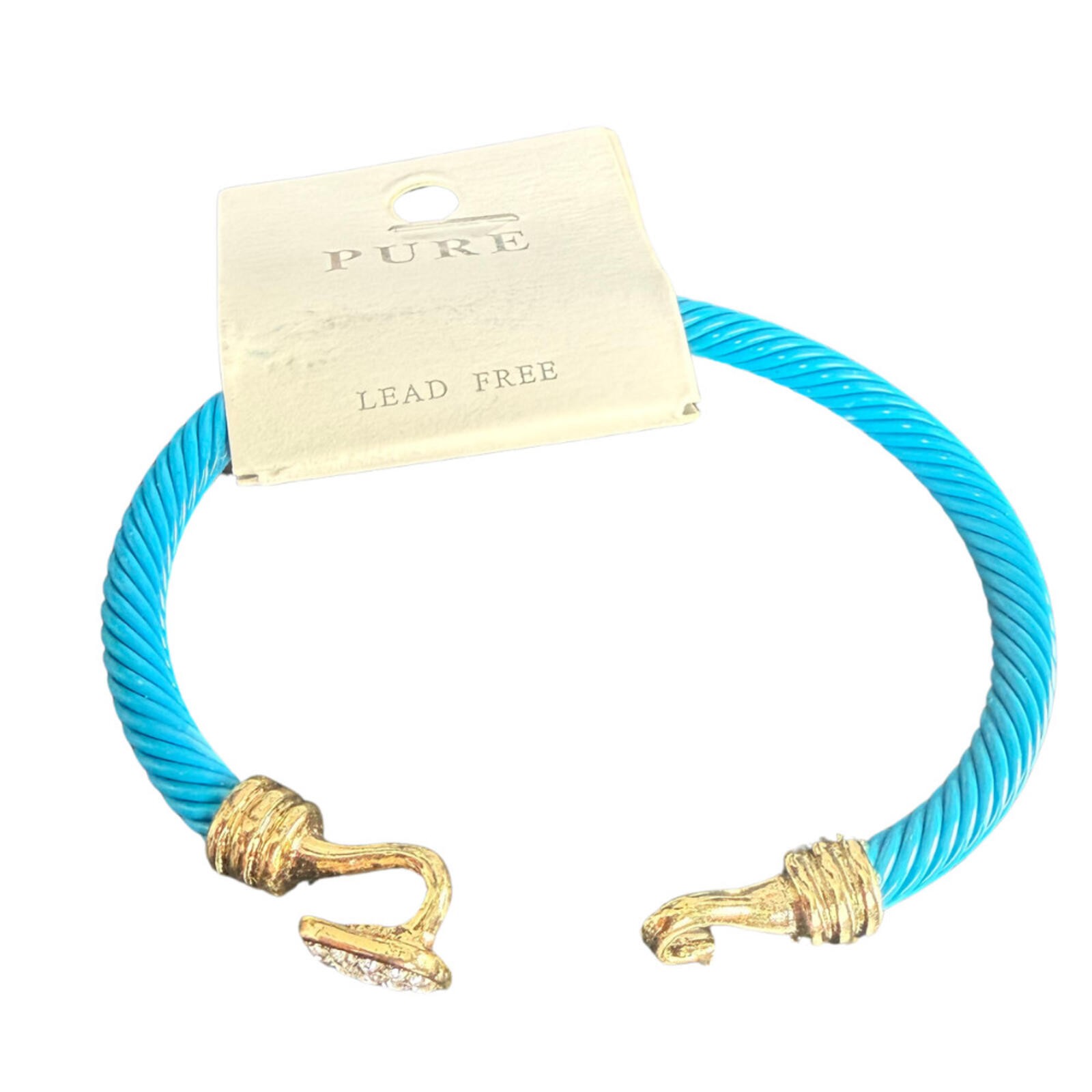 Blue cable cuff bracelet with gold accents and a crystal‑decorated end.