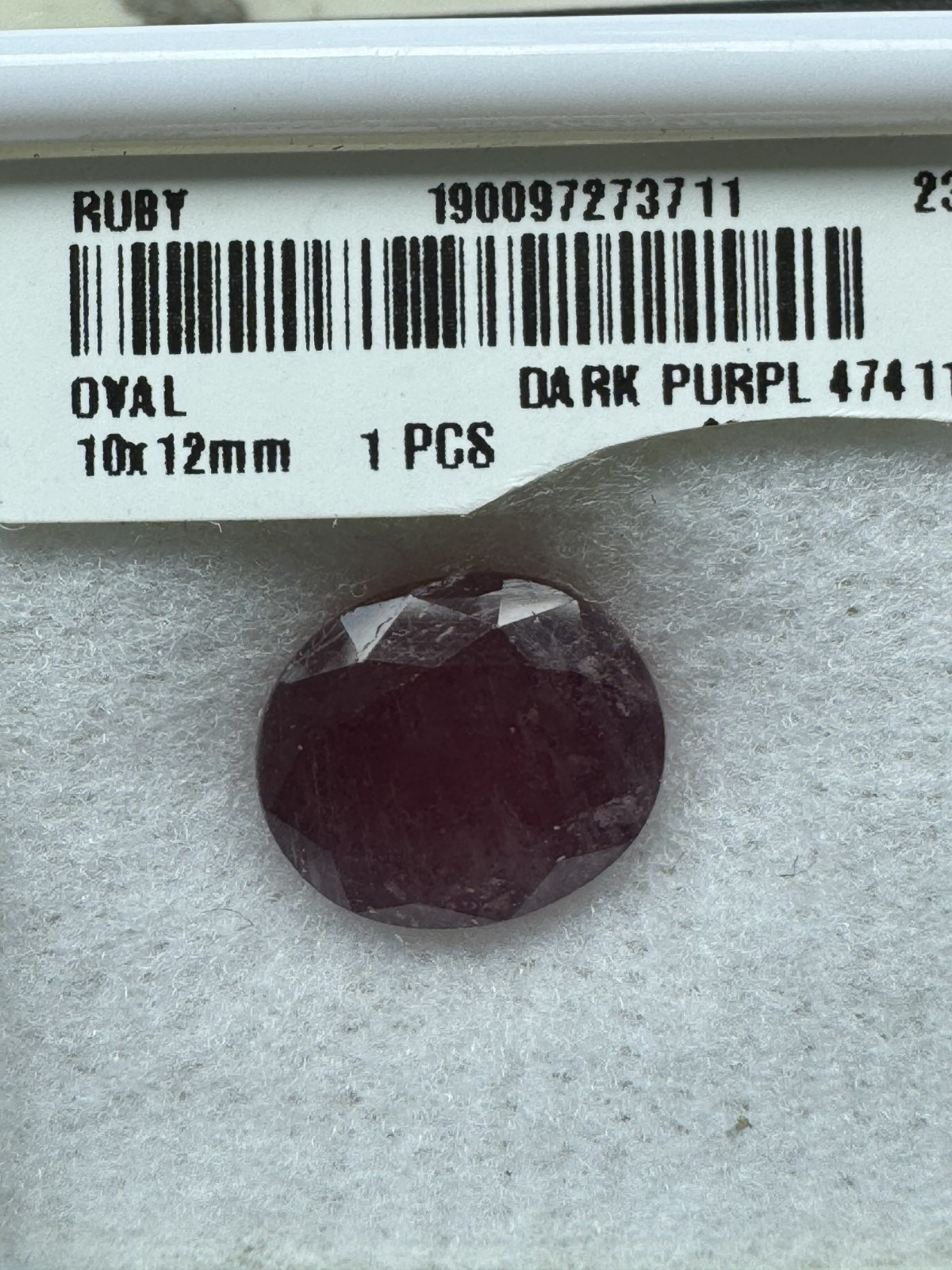 Dark Purple Red RUBY. 12 x 10 mm Oval, Slight Inclusion. 8.1 Carats.