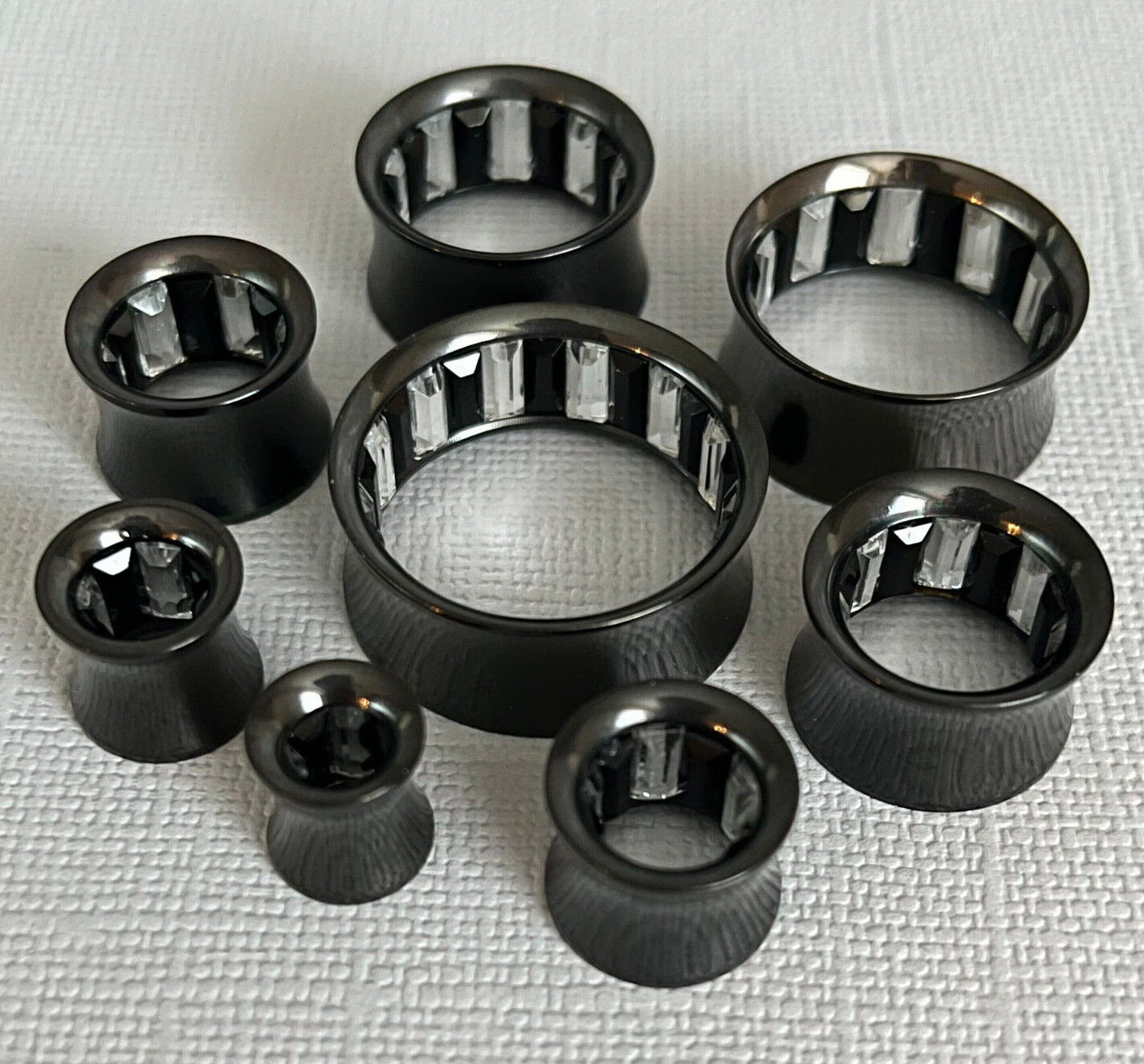 PAIR Inner Clear / Black Gem Black Ion Plated Steel Saddle Tunnels Plugs Gauges
