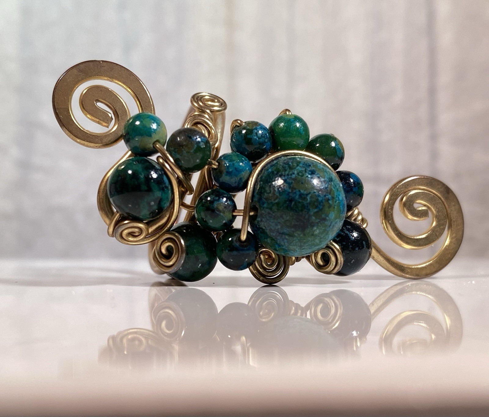 Handmade ring, green and blue gemstones, wire-wrapped in gold-toned metal