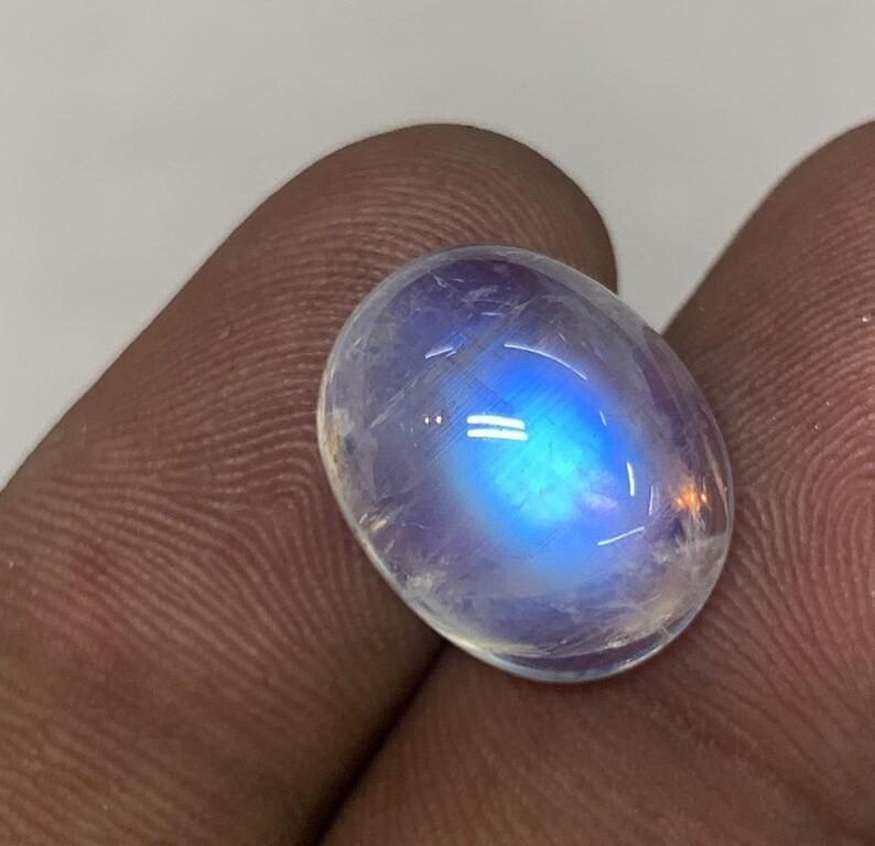 AAAAAAAA Quality Rainbow Moonstone Blue Fire Oval Shape Cabochon 12X15 MM