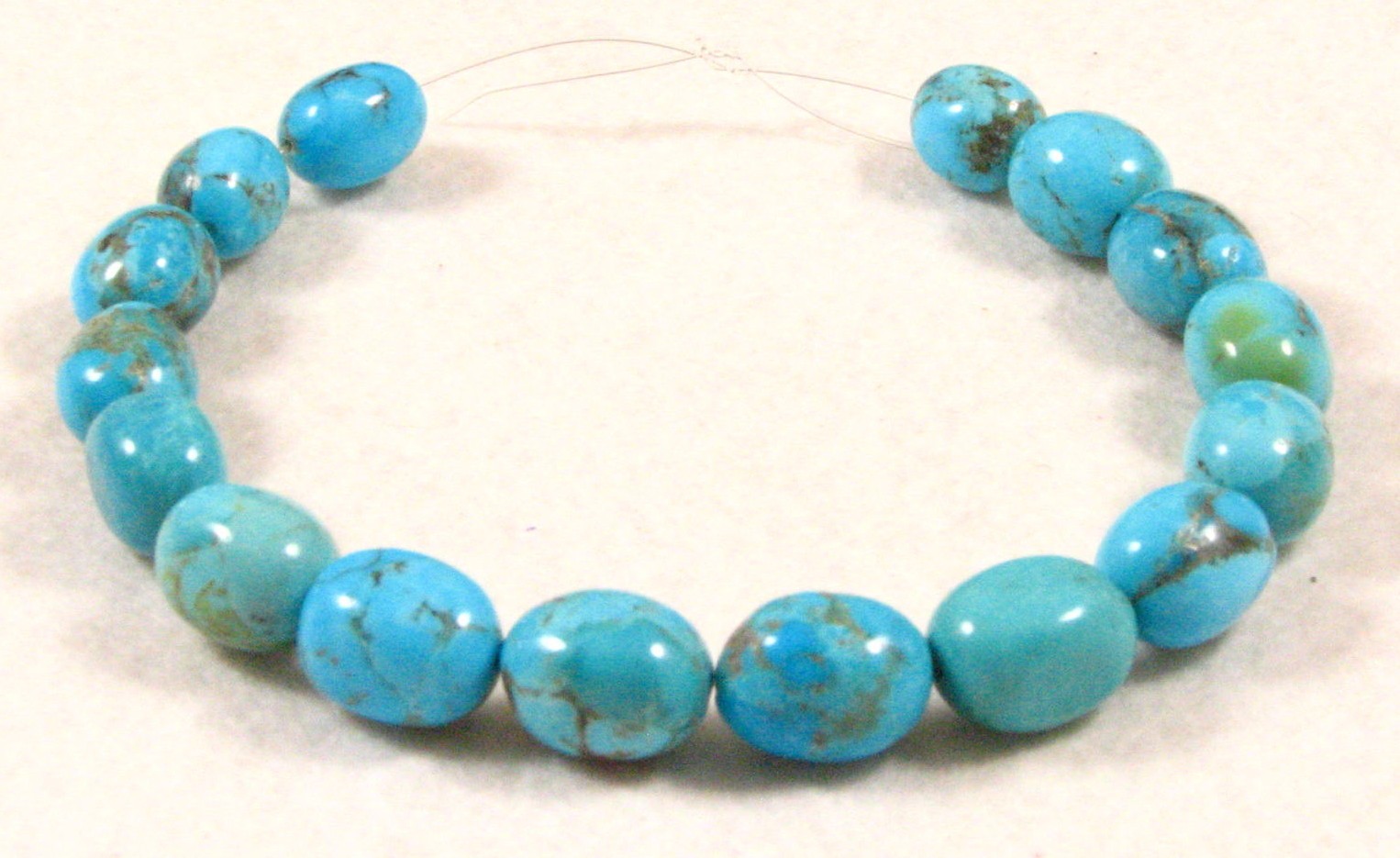 16 KINGMAN Turquoise Oval Beads 9 to 11 mm diameter by 12 to 15 mm long C