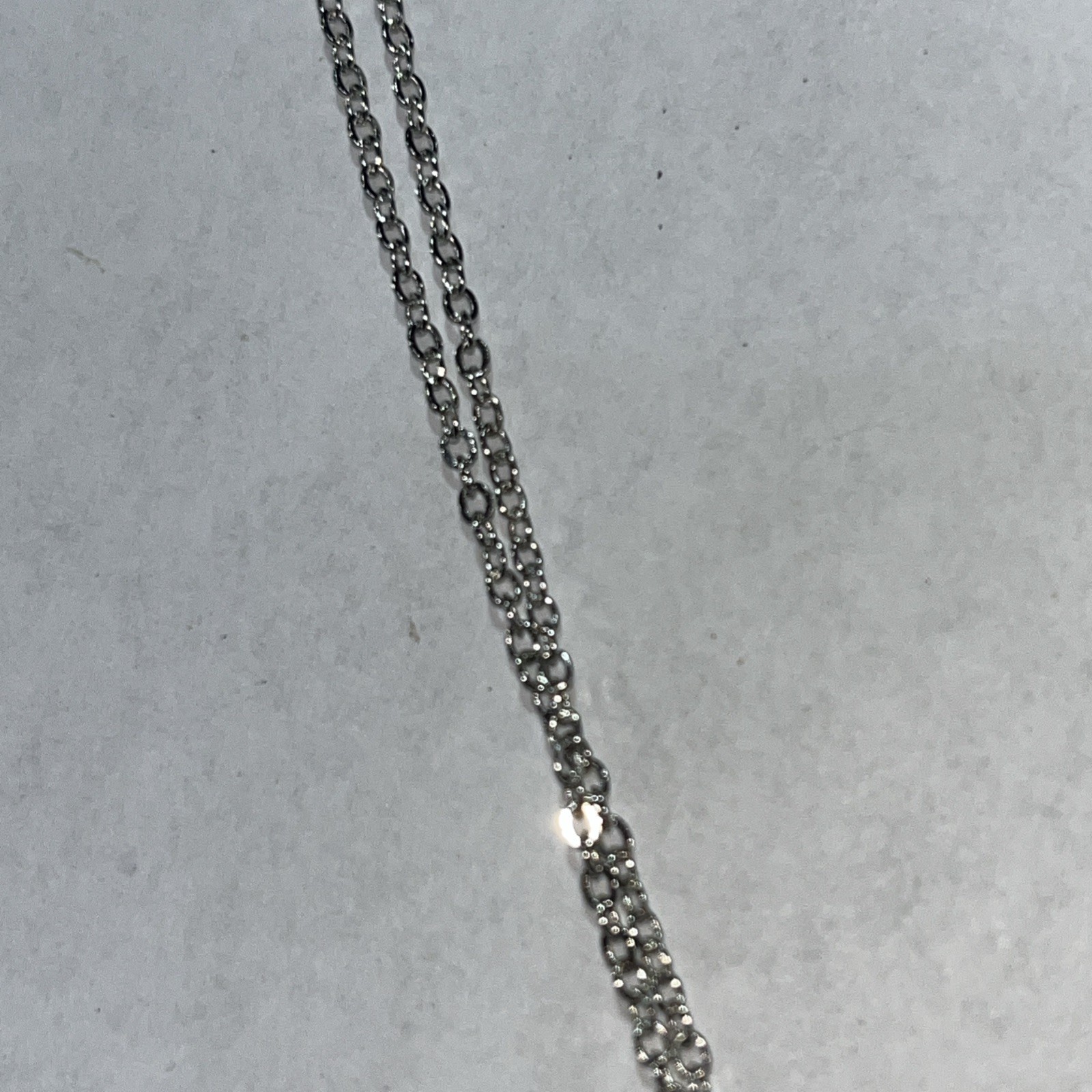 Blue rhinestone necklace in silvertone cage 14″ adjustable